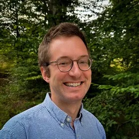 Robert Friedman standing over a bridge